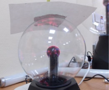 A clear ball with a red light inside

Description automatically generated